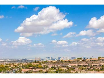 Expansive Las Vegas city view with fluffy clouds under a bright blue sky at 1964 Oliver Springs St, Henderson, NV 89052