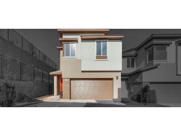 Modern two-story home with a two-car garage and neutral color palette at 11946 Glide Reflection Ave, Las Vegas, NV 89138