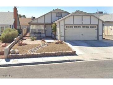 Charming single-story home with a two-car garage and well-kept landscaping at 6365 Copperfield Ave, Las Vegas, NV 89108