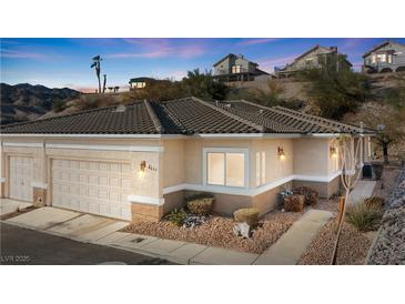 Charming single-story home featuring a low-maintenance landscape and a convenient two-car garage at 3342 Pheasant Canyon Way # 1013, Laughlin, NV 89029