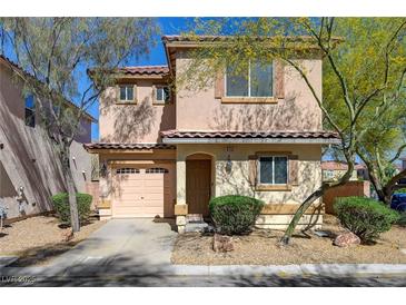 Charming two-story home with desert landscaping, attached garage, and stucco exterior at 8396 Pearl Beach Ct, Las Vegas, NV 89139