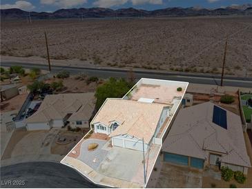 Charming single-story home in a desert community featuring low-maintenance landscaping and a two-car garage at 556 Decidedly St, Henderson, NV 89015