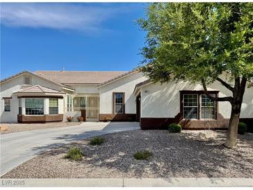 Charming single-story home featuring a well-maintained front yard and desert landscaping at 5422 Nestled Moon Ct, Las Vegas, NV 89131