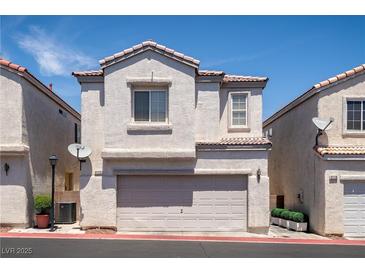 Charming two-story home featuring an attached two-car garage in a well-kept neighborhood at 3120 Inlet Bay Ave, North Las Vegas, NV 89031