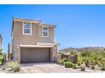 Charming two-story home with a two-car garage and mountain views at 12536 Blissful Sky St, Las Vegas, NV 89138