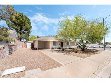 Charming single-story home with a well-maintained front yard and driveway at 429 Scenic Dr, Henderson, NV 89002