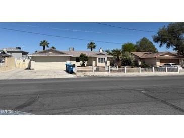 Charming single-story home with a well-maintained front yard and a classic design at 5170 S Pearl St, Las Vegas, NV 89120