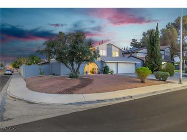 Charming two-story home featuring an attached two-car garage and well-maintained landscaping at 1808 Piccolo Way, Las Vegas, NV 89146
