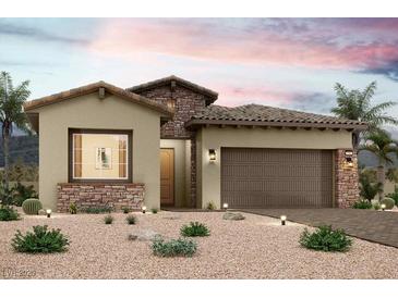 Charming single-story home featuring desert landscaping, a brick-paved driveway and a two-car garage at 77 Ibiza Lake Dr, Henderson, NV 89011
