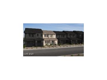 Charming townhomes feature diverse architectural styles and inviting entrances at 132 Silver Run Ln, Las Vegas, NV 89138
