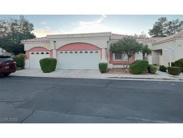 Charming home featuring a two-car garage, desert landscaping, and inviting curb appeal at 5165 Briar Meadow Way, Las Vegas, NV 89118