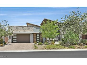 Beautiful single-story home with desert landscaping and a stone facade at 6184 Willow Rock St, Las Vegas, NV 89135