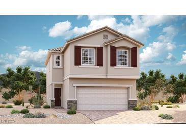 Charming two-story home featuring desert landscaping, a two-car garage, and a welcoming front entrance at 1054 Ferodale Ave, North Las Vegas, NV 89084