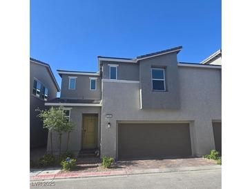 Charming two-story home with a two-car garage and a well-maintained front yard in a desirable neighborhood at 2691 Mango Light Ave, North Las Vegas, NV 89086