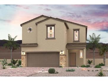 Charming two-story home featuring desert landscaping and a two-car garage with stone accents at 9958 Ruby Dome Ave, Las Vegas, NV 89178