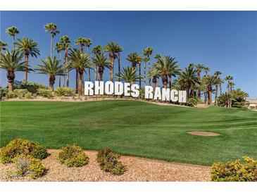 Expansive Rhodes Ranch signage surrounded by mature palms and vibrant green lawns at 248 Windmill Croft Dr, Las Vegas, NV 89148