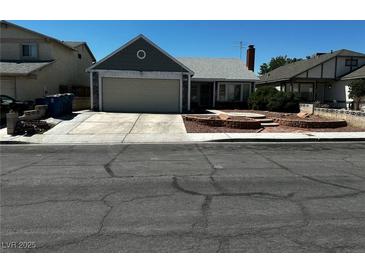 Charming one-story home featuring a two-car garage and a well-maintained front yard at 6361 Copperfield Ave, Las Vegas, NV 89108