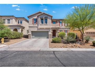 Charming two-story stucco home with desert landscaping and a two-car garage at 7194 Clear Range Ave, Las Vegas, NV 89178