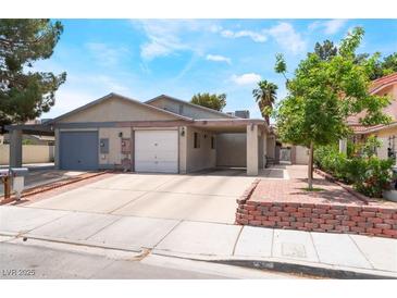 Charming single-story home with a well-maintained front yard and convenient carport at 25 Colbath St, Las Vegas, NV 89110