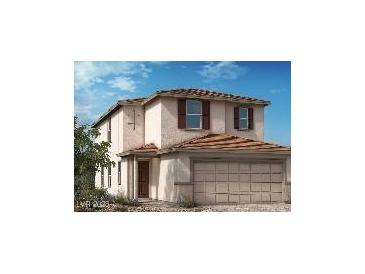Charming two-story home featuring stucco siding, brown shutters, and a tile roof at 9649 Hinson St, Las Vegas, NV 89139