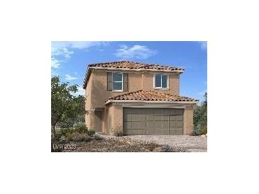 Two-story home with a tile roof and a two-car garage, offering classic suburban charm at 9661 Hinson St, Las Vegas, NV 89139