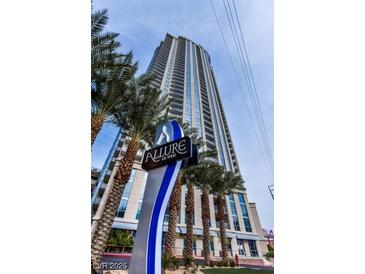 Exterior view of the Allure Las Vegas high rise condominium building, sign, and palm trees at 200 W Sahara Ave # 1703, Las Vegas, NV 89102