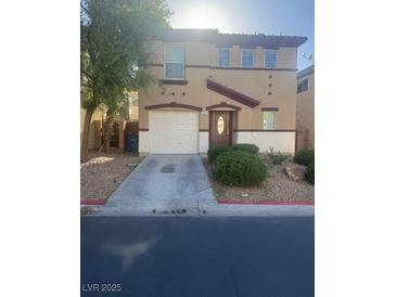 Charming two-story home with a garage and landscaping at 523 Cabis Bay St, Las Vegas, NV 89178