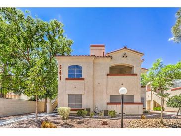 Charming condo featuring desert landscaping and a terracotta colored roof at 541 Indian Bluff St # 201, Las Vegas, NV 89145