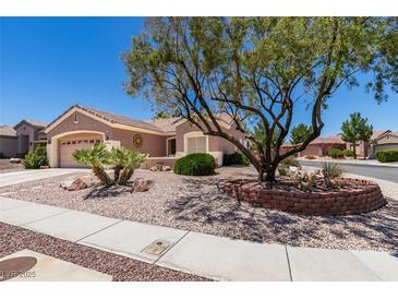 Charming single-story home featuring desert landscaping and a well-maintained front yard at 2114 High Mesa Dr, Henderson, NV 89012