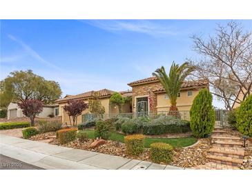Charming single-story home with well-manicured landscaping and inviting front entrance at 2151 Bannerwood St, Henderson, NV 89044