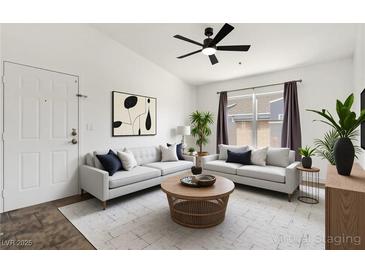 Bright living room featuring modern decor, neutral colors, and ample natural light at 6955 N Durango Dr # 3089, Las Vegas, NV 89149