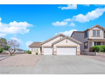 Charming single Gathering home with a three-car garage and mature landscaping at 82 Autumn Day St, Henderson, NV 89012