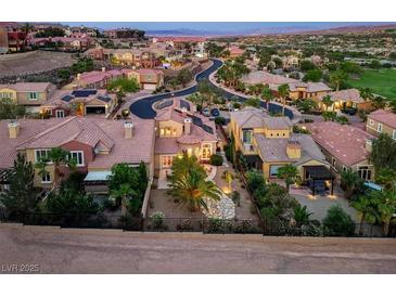 Beautiful single-Gathering home featuring manicured landscaping, stone accents, and a welcoming front entrance at 1 Cerchio Basso, Henderson, NV 89011