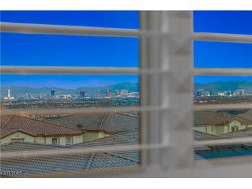 Breathtaking Las Vegas city view through the window, showcasing the skyline and distant mountains at 4576 Amazing View St, Las Vegas, NV 89129