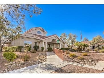 Charming clubhouse with inviting entrance and well-maintained landscaping at 7912 Foxwood Pl # 104, Las Vegas, NV 89145
