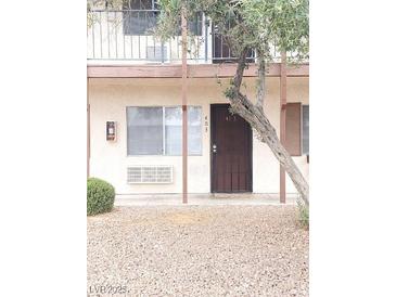 The unit's front entryway features a security door and easy access to a front-facing window at 4955 Jeffreys St # 403, Las Vegas, NV 89119
