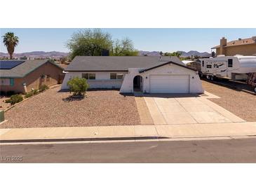 Charming single-story home with desert landscaping and a two-car garage at 616 Fernbrook Dr, Henderson, NV 89002