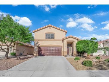 Charming two-story home featuring a well-maintained yard with a two car garage and desert landscaping at , North Las Vegas, NV 89031
