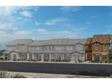 Charming townhome featuring neutral colors and an inviting entrance at 2772 Via Napoli, Henderson, NV 89044