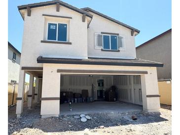 Charming two-story home with a spacious two-car garage, ready for your personal touches and customization at 3389 La Cura Ave # Lot 43, Las Vegas, NV 89141