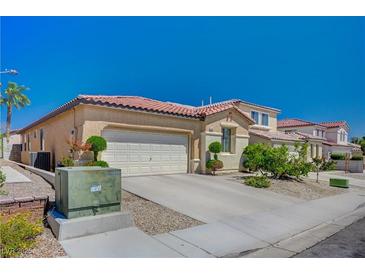 Charming single-story home featuring a terracotta tile roof and a spacious two-car garage at 5548 Spearfish Lake Ct, Las Vegas, NV 89148
