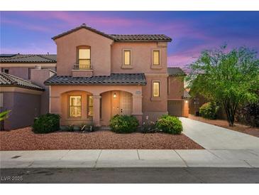 Charming two-story stucco home with a tile roof and well-manicured landscaping creating a welcoming curb appeal at 11274 Civita St, Las Vegas, NV 89141