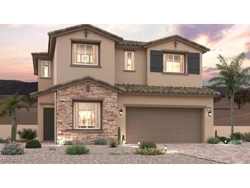 Charming two-story home featuring stone accents, a tile roof, and desert landscaping at 188 Kobuk Ave, Henderson, NV 89011