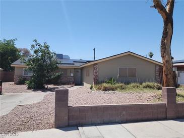 Charming single-story home with brick accents and low-maintenance landscaping, offering curb appeal at 109 Prince Ln, Las Vegas, NV 89110