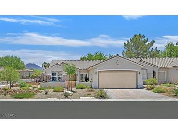 Charming single-story home with desert landscaping and a two-car garage at 2601 Harrisburg Ave, Henderson, NV 89052