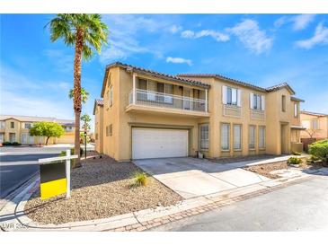 Charming two-story home with a two-car garage, balcony, and landscaped front yard at 8109 Retriever Ave, Las Vegas, NV 89147