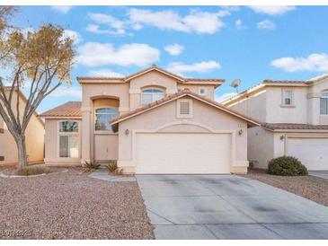 Charming two-story home featuring an attached two-car garage and a xeriscaped front yard for low maintenance at 829 Dancing Vines Ave, Las Vegas, NV 89183