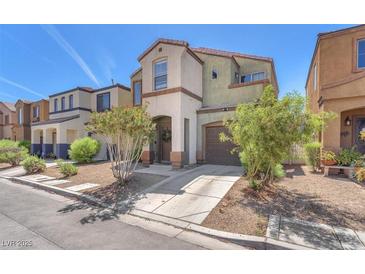 Charming two-story home features a welcoming entryway, attached garage, and well-maintained landscaping at 2837 Canonero St, Las Vegas, NV 89142