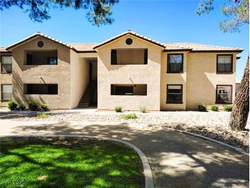 Charming two-story multi-Gathering home with landscaped walkway and lush lawn at 2451 N Rainbow Blvd # 2073, Las Vegas, NV 89108