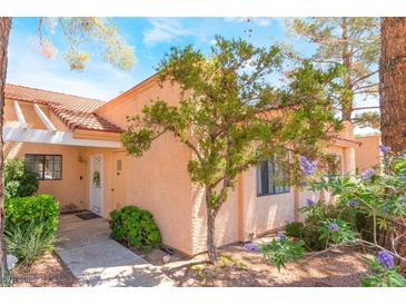 Charming single-story home featuring mature trees and a well-maintained front yard at 2851 S Valley View Blvd # 1071, Las Vegas, NV 89102